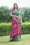 Green and pink color bandhej silk saree with printed work