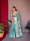 Rama green color linen silk saree with zari weaving work