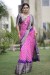 Pink and purple color bandhej silk saree with zari weaving work