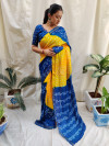 Yellow and blue color bandhej silk saree with printed work