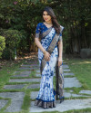 Navy  blue color dola silk saree with zari weaving work