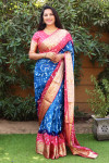 Blue and pink color bandhej silk saree with zari weaving work