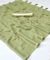 Pista green color soft georgette saree with zari weaving work