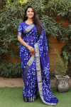 Royal blue color bandhej silk saree with zari weaving work