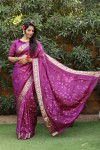 Magenta color bandhej silk saree with zari weaving work