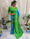 Sky blue and green color bandhej silk saree with printed work