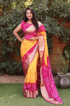 Yellow and pink color bandhej silk saree with zari weaving work
