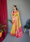 Yellow color tussar silk saree with zari weaving work