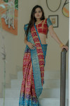 Pink and sky blue color bandhej silk saree with zari weaving work