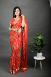 Red color bandhej silk saree with zari weaving work