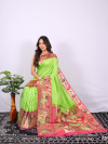 Parrot green color paithani silk saree with zari woven work