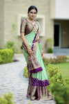 Parrot green and magenta color bandhej silk saree with zari weaving work