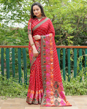 Maroon color bandhej silk saree with woven design