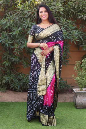 Pink and black color bandhej silk saree with zari weaving work