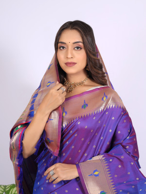Light purple color paithani silk saree with zari weaving work