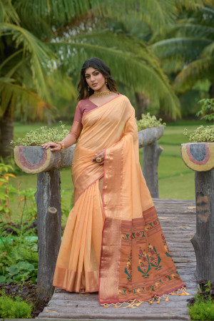 Orange color chanderi silk saree with zari woven work