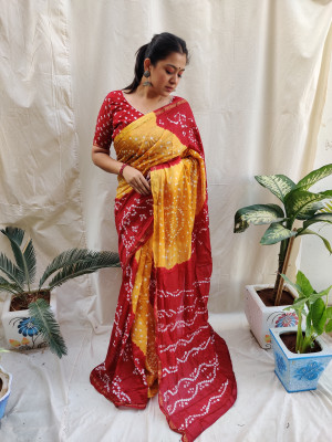 Yellow and red color bandhej silk saree with printed work