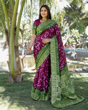 Magenta and green color bandhej silk saree with zari weaving work