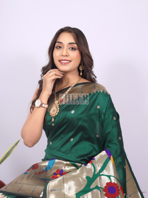 Dark green color paithani silk saree with zari weaving work