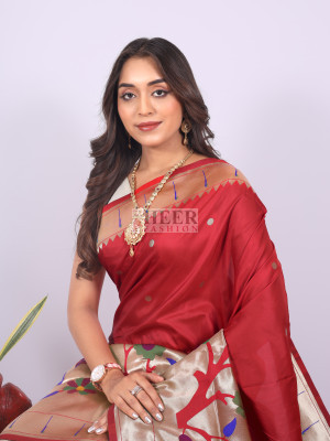 Red color paithani silk saree with zari weaving work