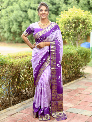 Lavender and purple color bandhej silk saree with zari weaving work