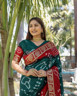 Green and red color bandhej silk saree with zari weaving work