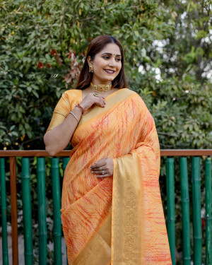 Orange color dola silk saree with digital printed work