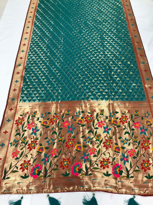 Rama green color paithani silk saree with zari weaving work