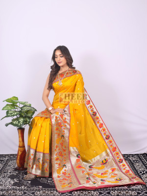 Purple color paithani silk saree with zari woven work