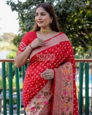 Red color bandhej silk saree with zari weaving work