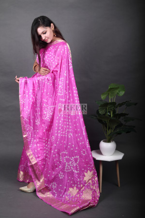 Pink color bandhej silk saree with zari weaving work