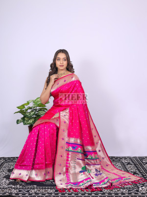 Rani pink color paithani silk saree with zari weaving work