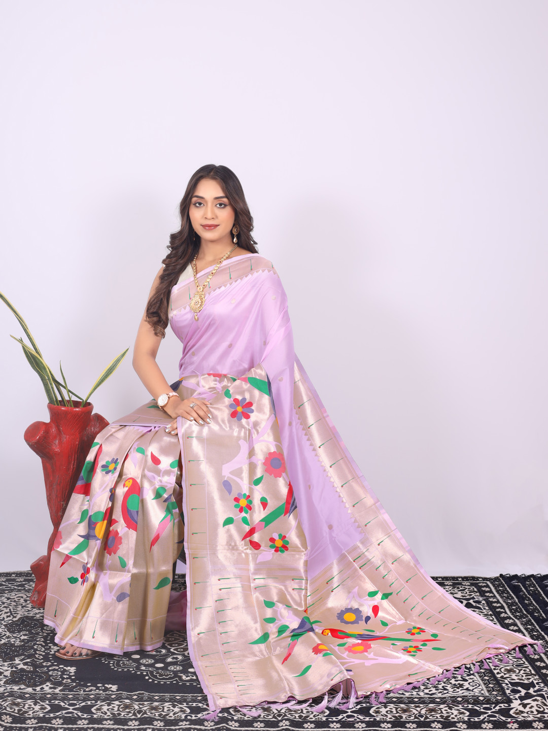 Lavender color paithani silk saree with zari weaving work