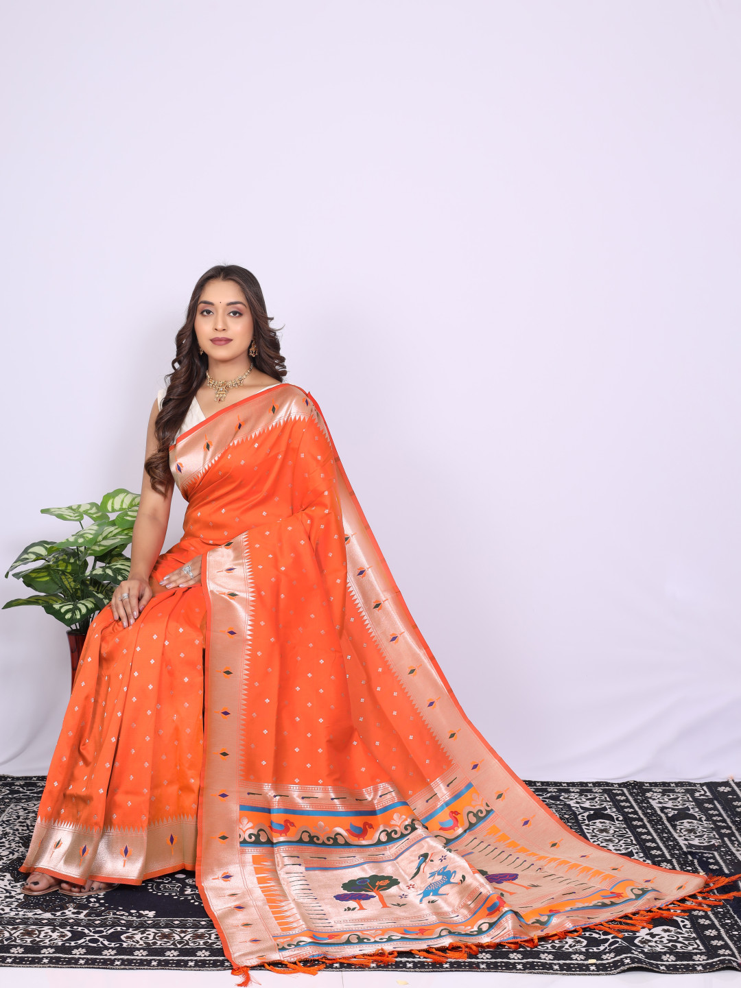 Orange color paithani silk saree with zari weaving work