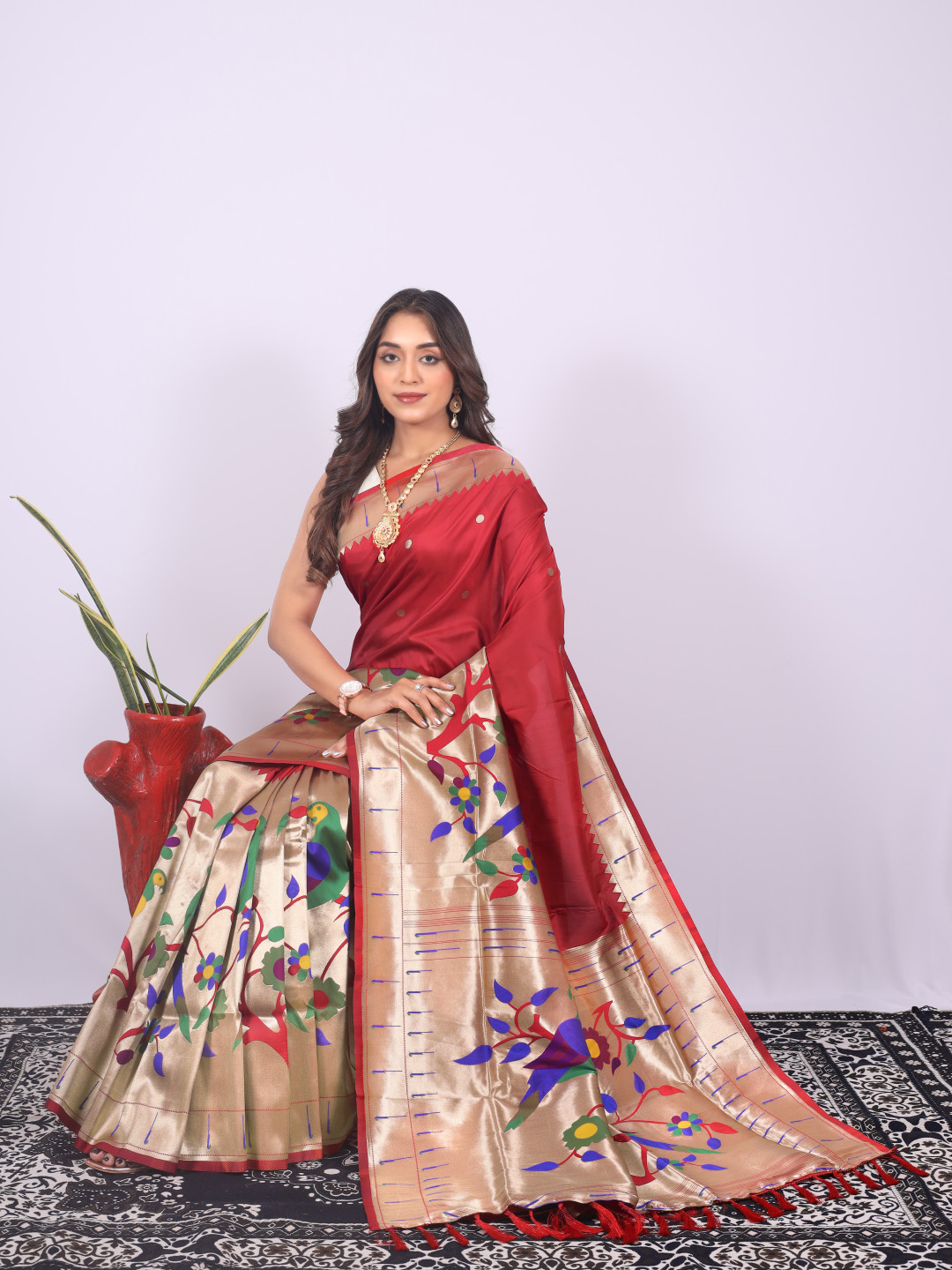 Red color paithani silk saree with zari weaving work