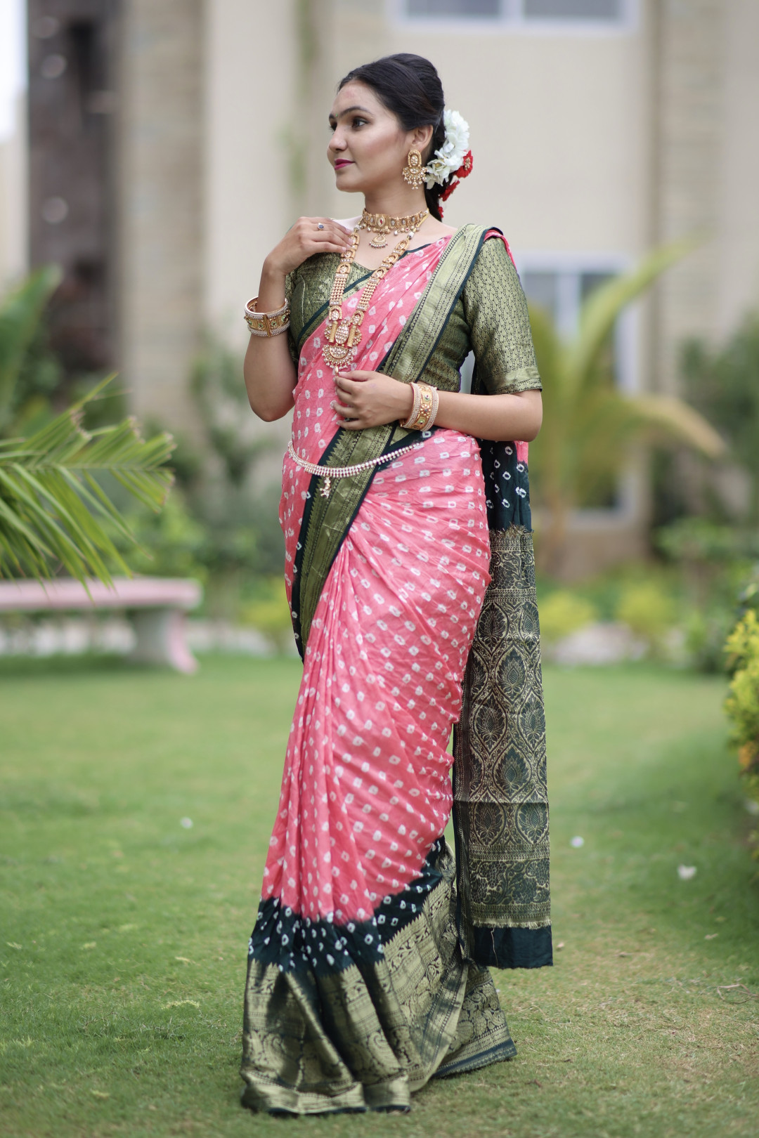 Gajari and green color bandhej silk saree with zari weaving work