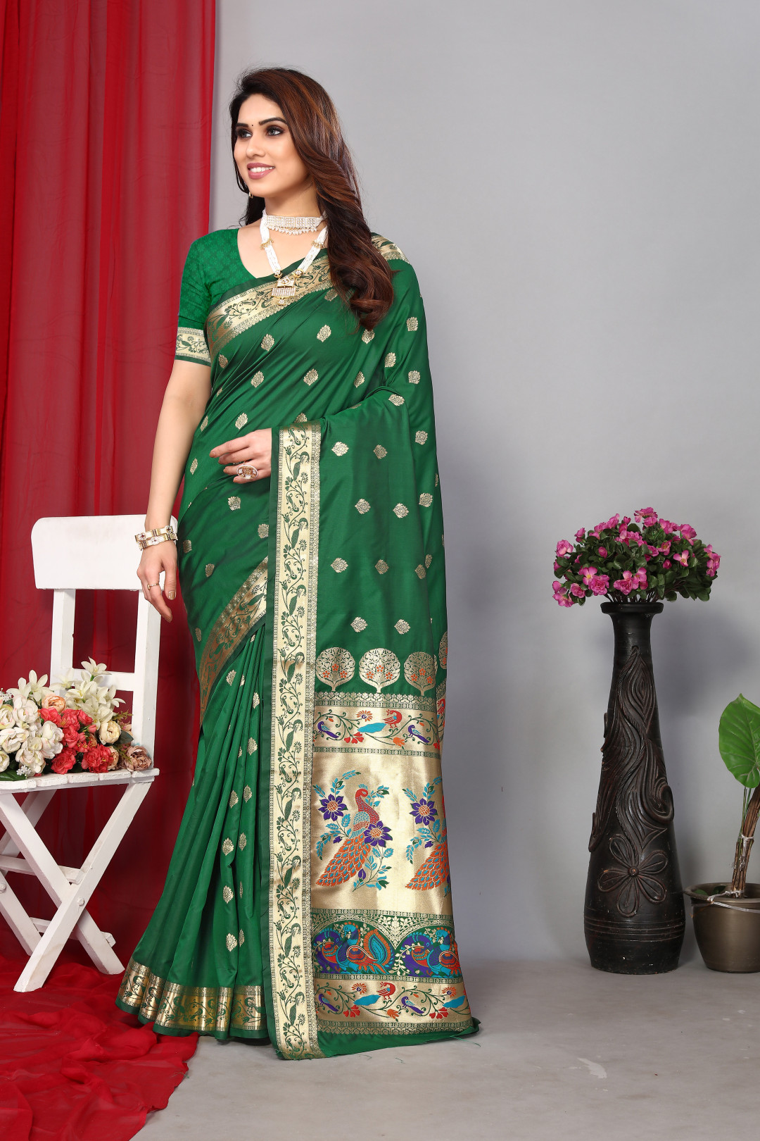 Dark green color paithani silk saree with zari weaving work