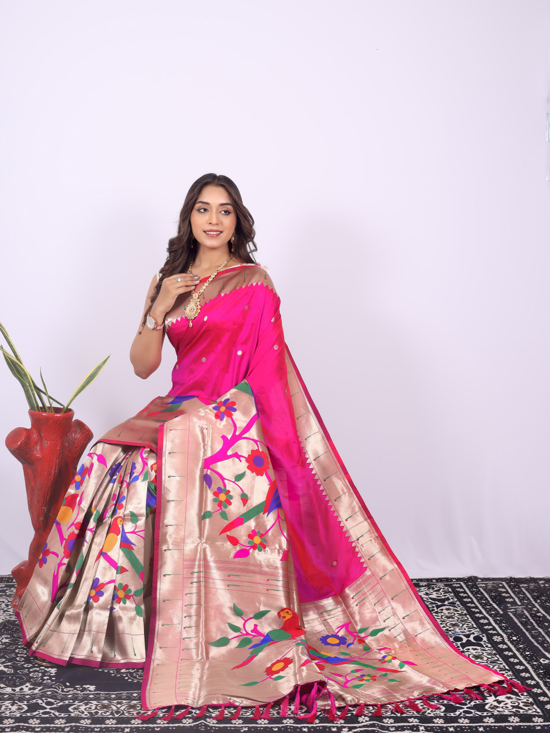 Rani pink color paithani silk saree with zari weaving work