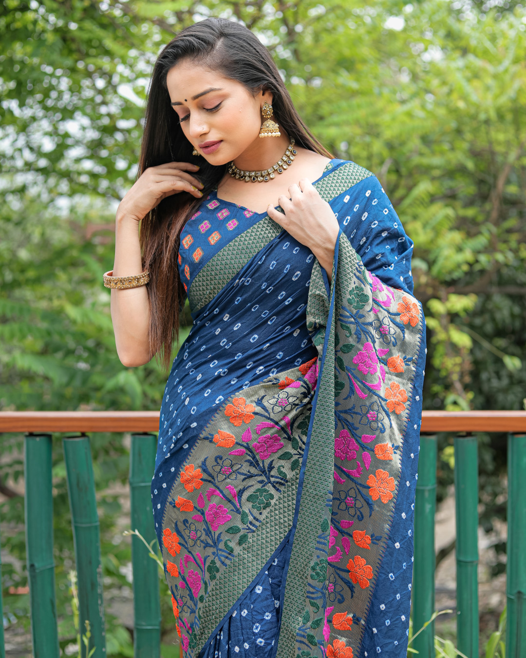 Firoji color bandhej silk saree with woven design