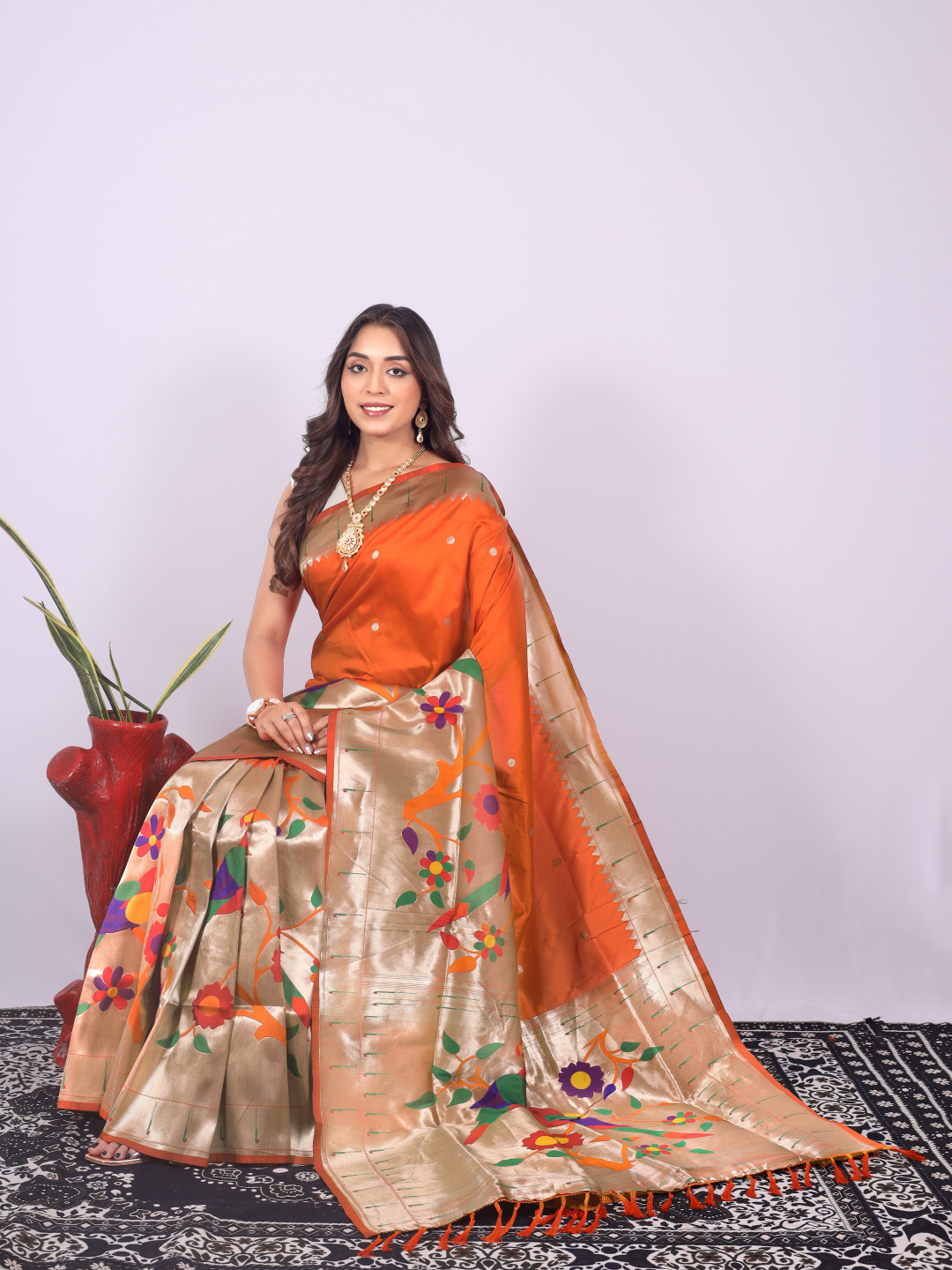 Orange color paithani silk saree with zari weaving work