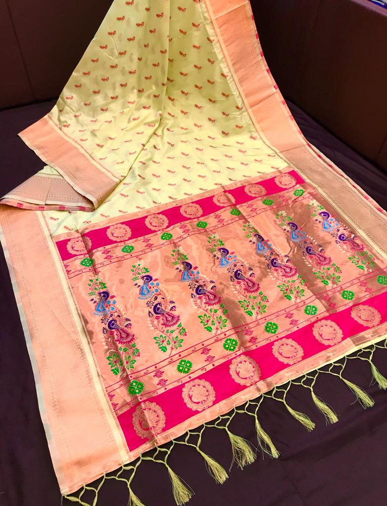 Yellow color paithani silk saree with zari weaving work