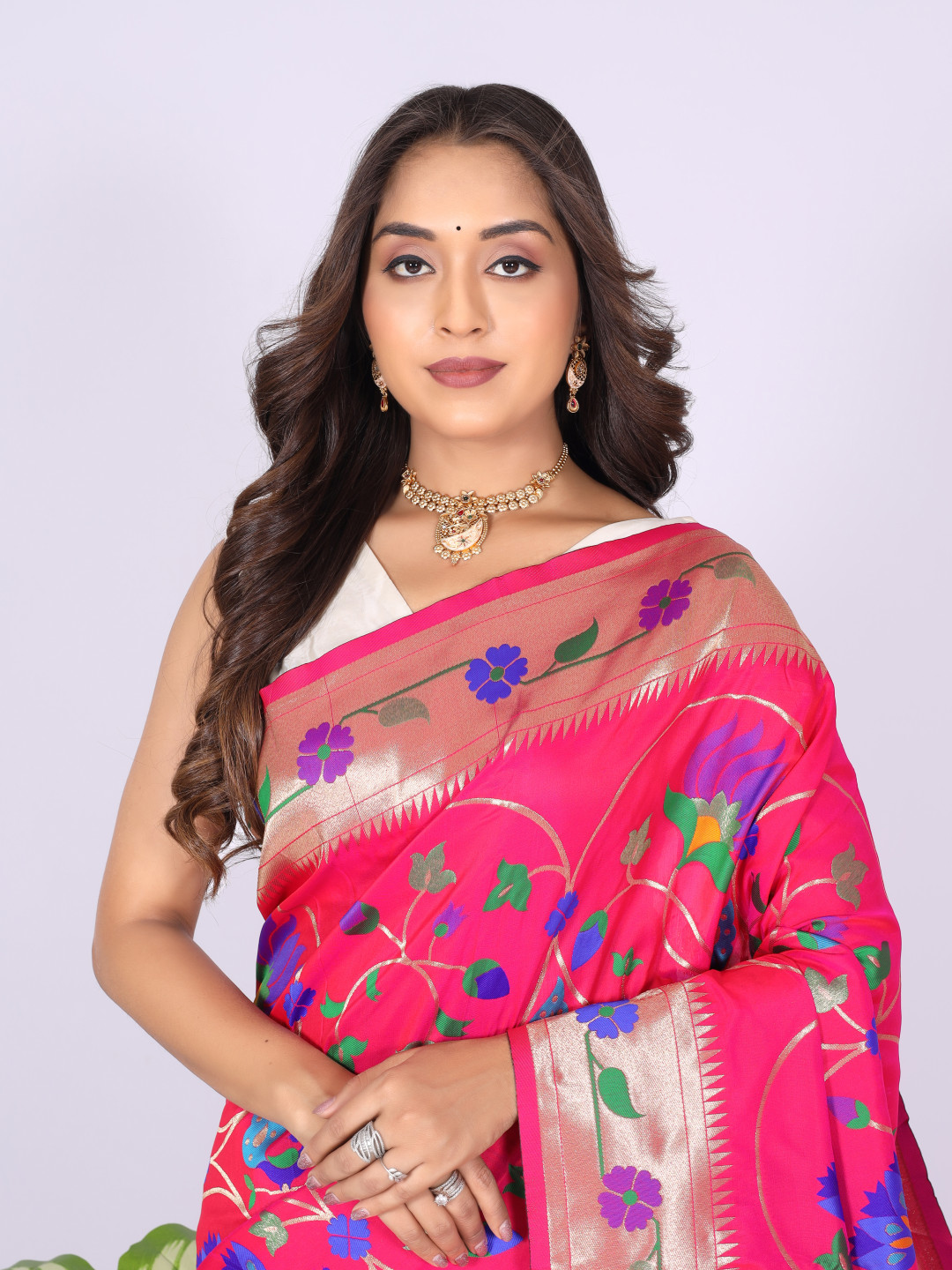 Rani pink color paithani silk saree with zari weaving work