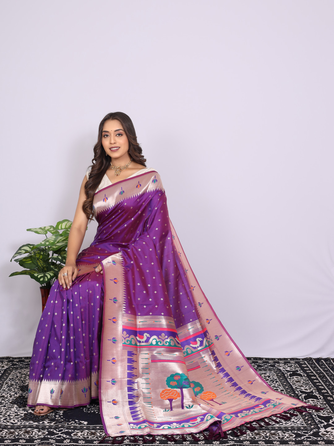Purple color paithani silk saree with zari weaving work