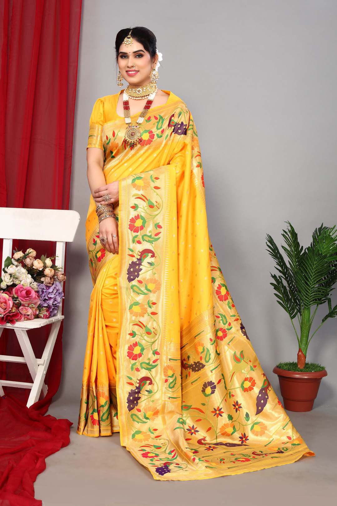 Yellow color paithani silk saree with zari weaving work