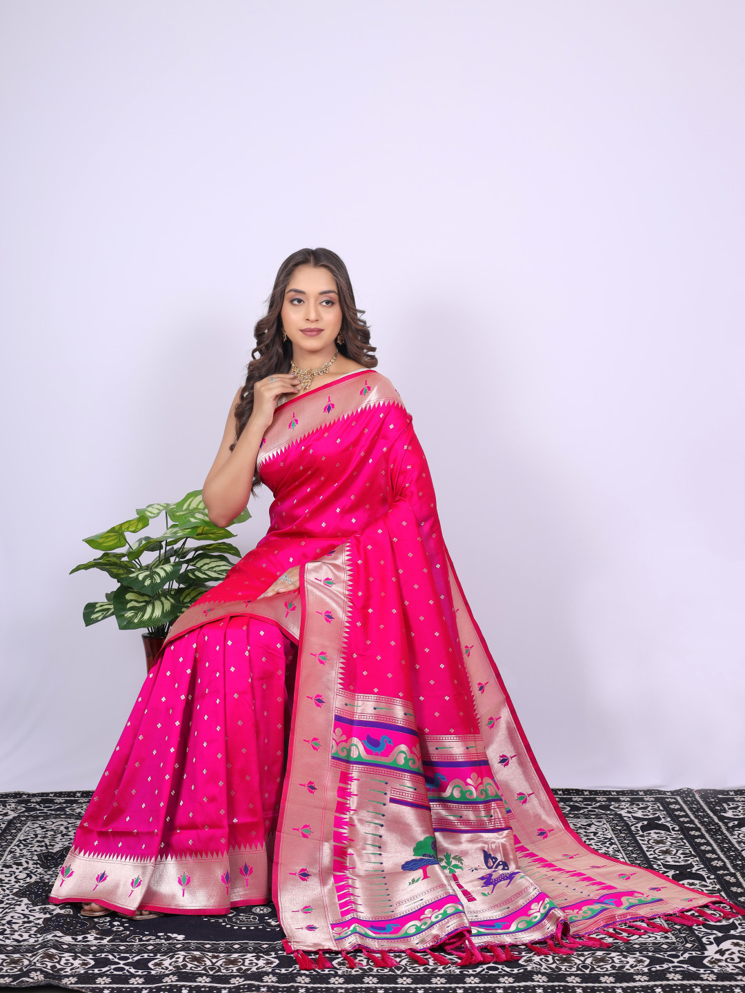 Rani pink color paithani silk saree with zari weaving work