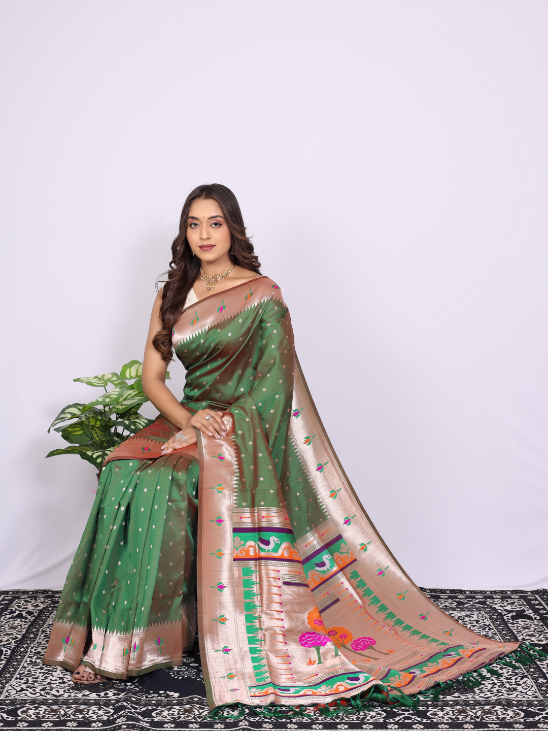 Green color paithani silk saree with zari weaving work