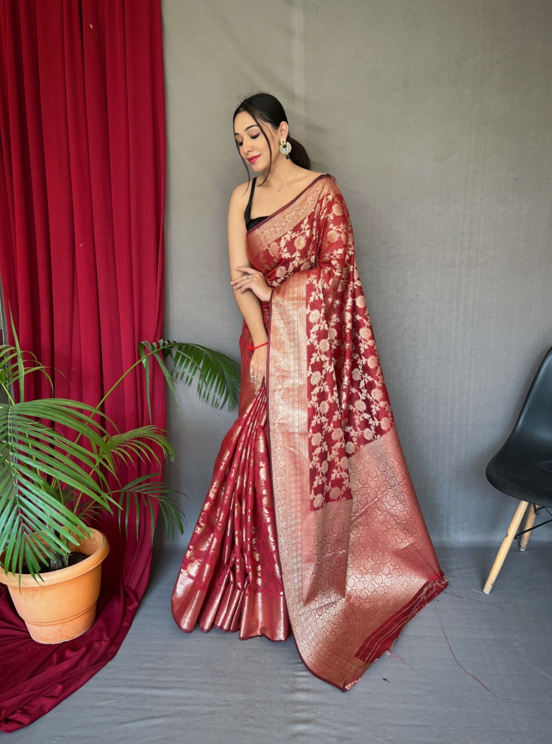 Maroon color linen silk saree with zari weaving work