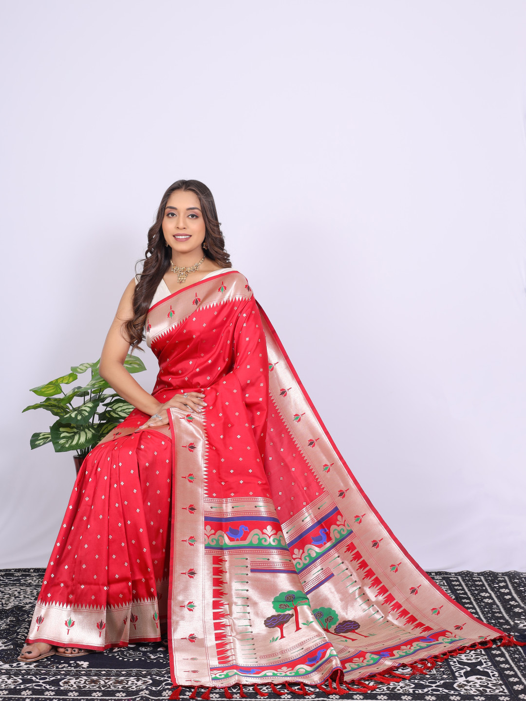Red color paithani silk saree with zari weaving work