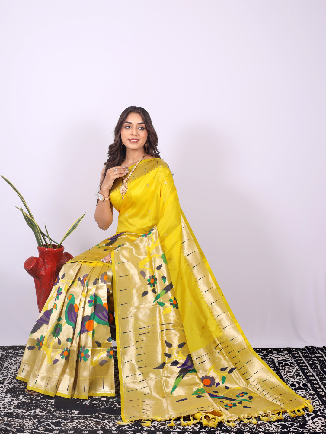 Yellow color paithani silk saree with zari weaving work