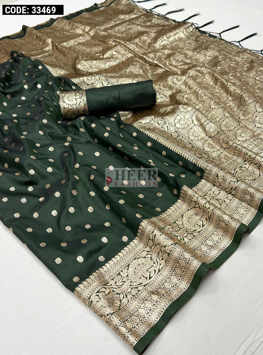 Bottle green color soft banarasi silk saree with zari weaving work